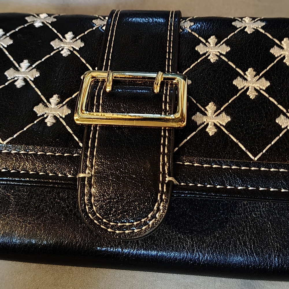 Chic Black and White Wallet with Gold Buckle